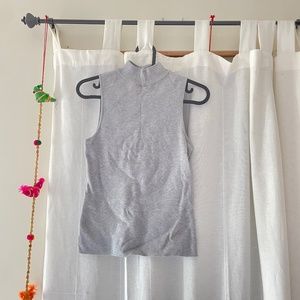 Sleeveless mock turtleneck
